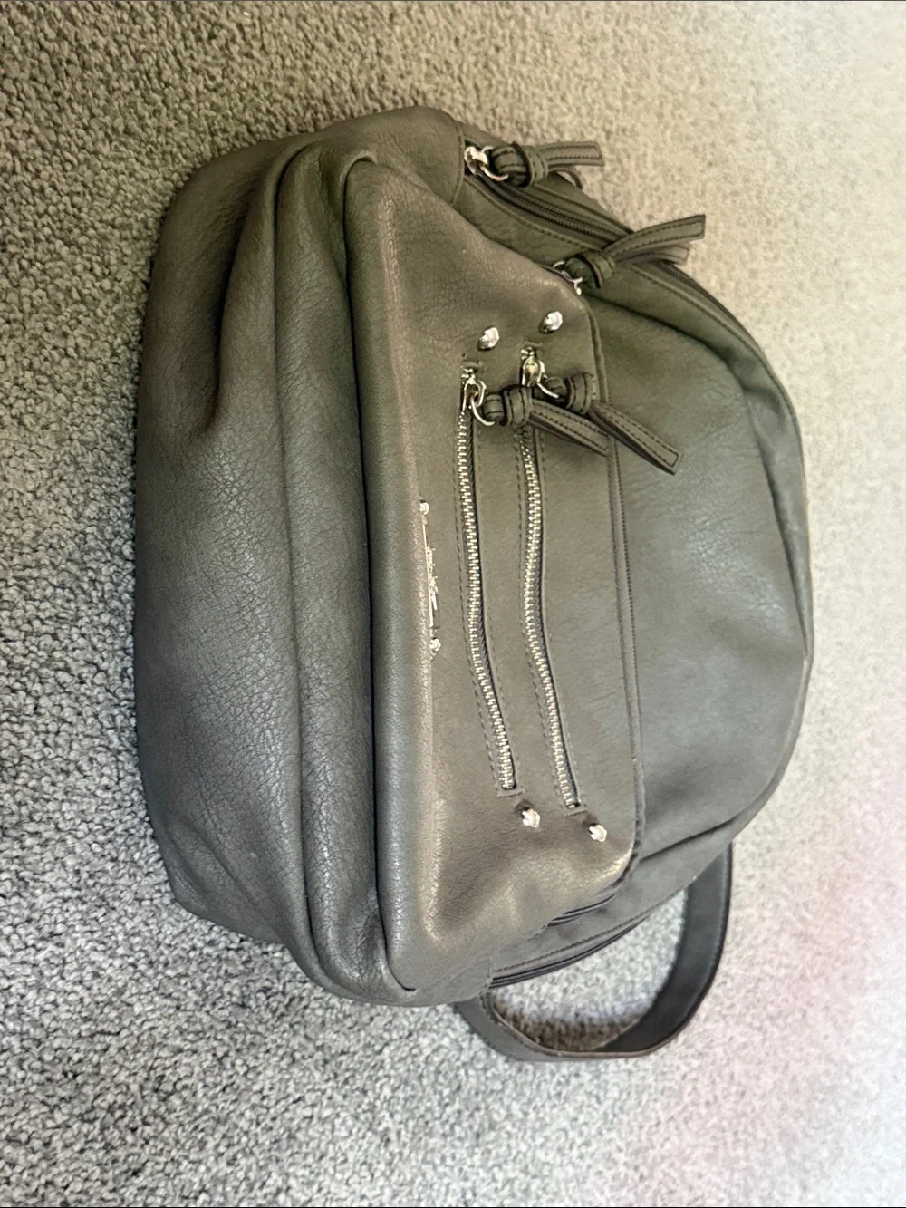 Nicole Miller Gray Faux Leather Backpack Bag. Adjustable Straps. 12”x12”x4”.